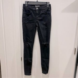 Used stretch distressed skinny jeans